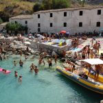 Sicilians by the sea on Ferragosto